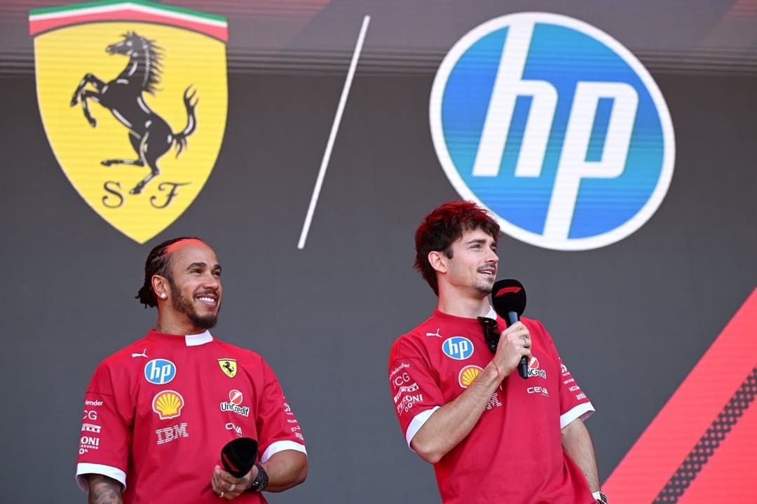 Charles Leclerc's hilarious reaction to Lewis Hamilton driving Ferrari's new EV goes viral - Motorsport.com