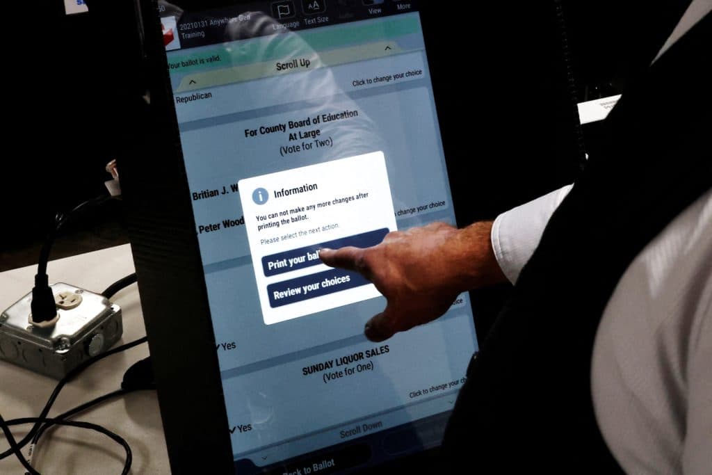 DOJ monitoring plans and DHS voter checks raise concerns of election interference - PBS