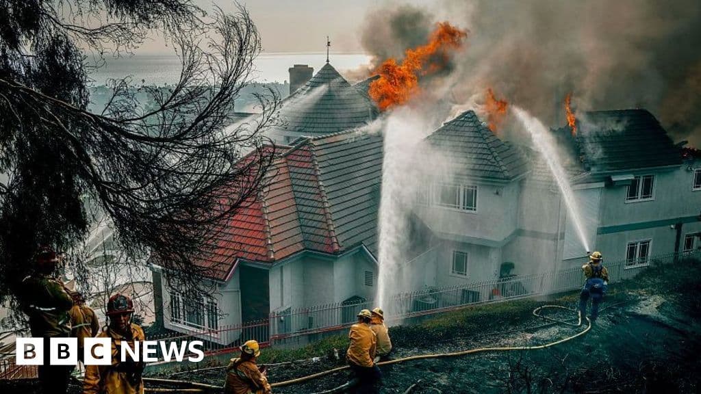 Fast-moving California wildfire burns homes as people are ordered to leave - BBC