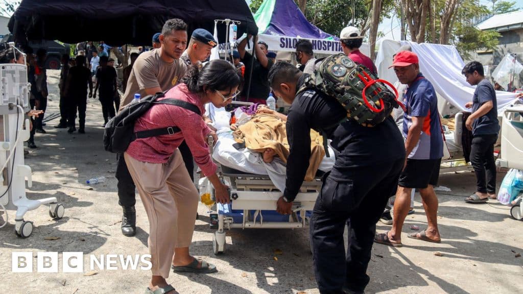 Rescuers search for survivors of powerful Indonesia earthquake - BBC