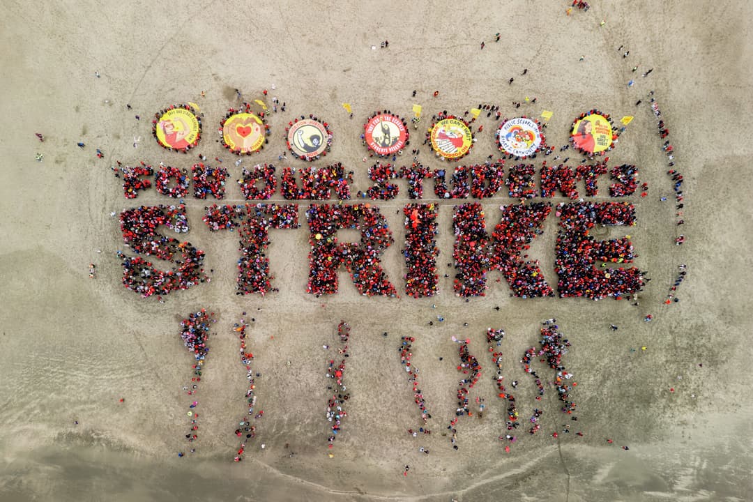 S.F. teachers strike: Union supporters form human banner at Ocean Beach, negotiations ongoing - San Francisco Chronicle