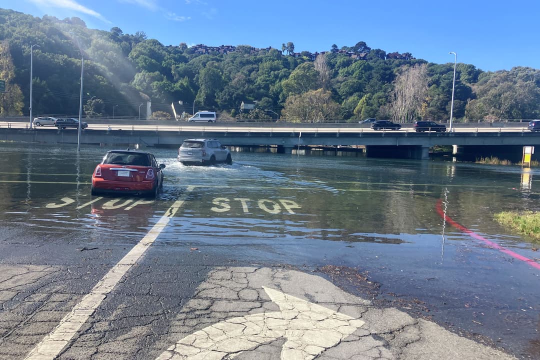 Video: Trapped Marin drivers push through deep water after highway on-ramp turns into lake - San Francisco Chronicle